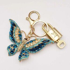 Authentic Louis Vuitton Lock & Key with unbranded Butterfly Bagcharm, Keycharm